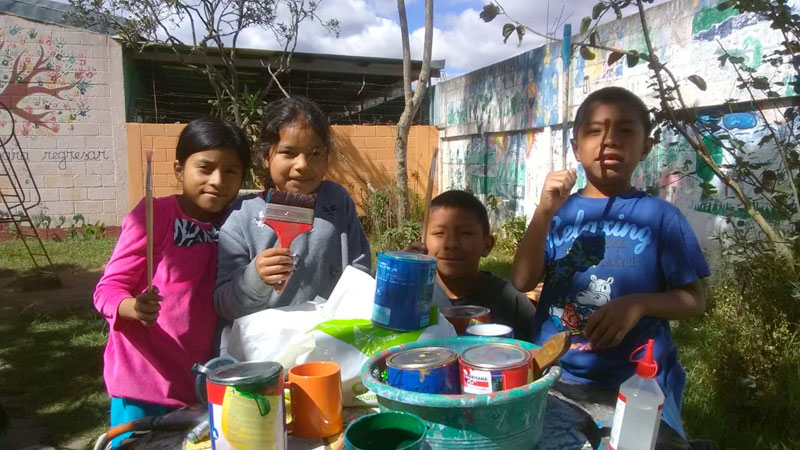 Painting the kindergarten facilities at Manos Amigas Guatemala